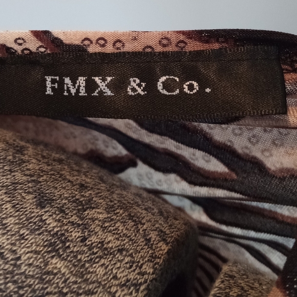 Peplum Animal Print Top - Picture 4 of 7